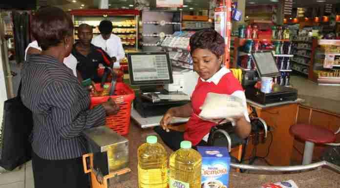 Spending declines as 2% tax bites