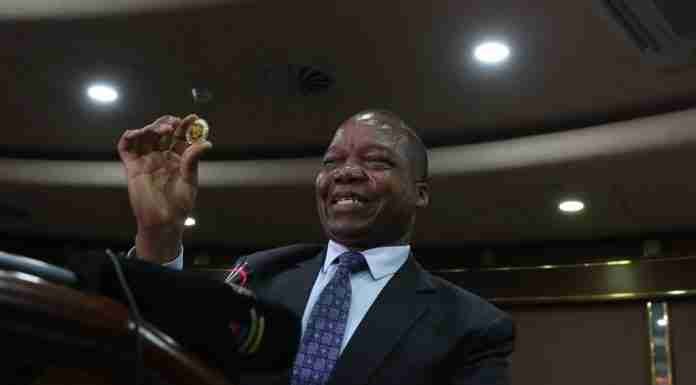 IMF tells Zimbabwe: keep monetary policy tight, lift forex controls, wind down gold coins